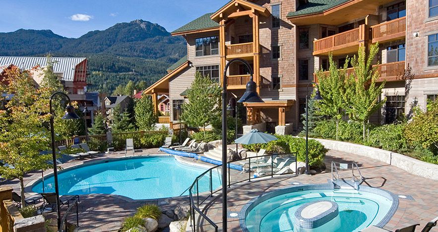 Enjoy the outdoor pools and hot tub at First Tracks. - image_6