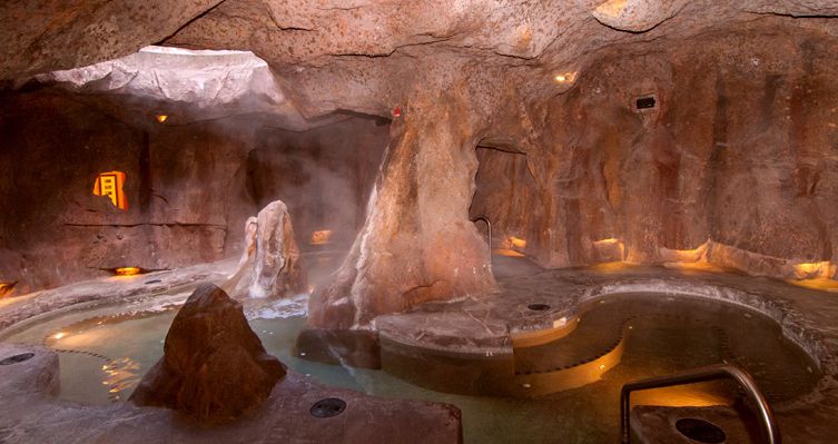 The grotto-style hot pools is a hit with the kids. - image_3