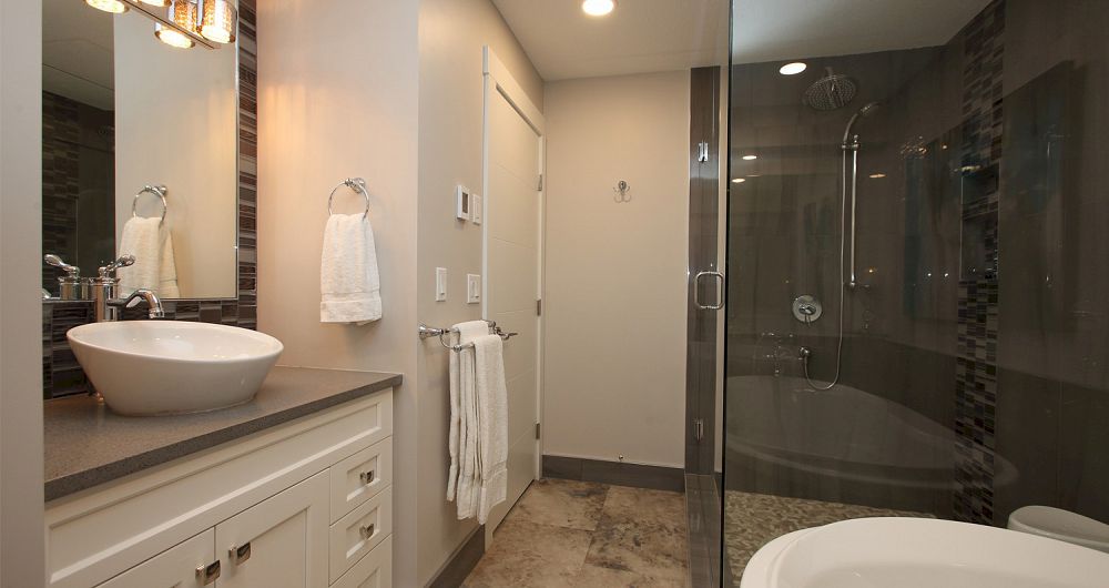 Modern bathrooms with soaking tubs. - image_4