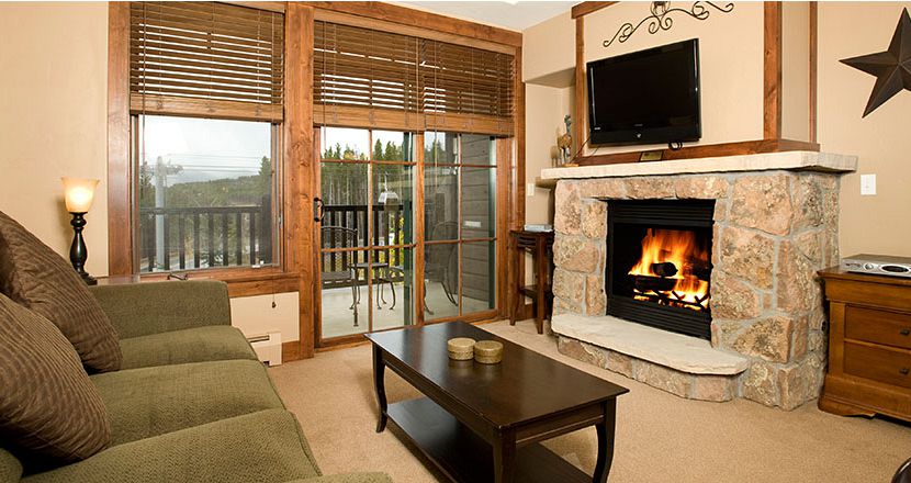 Enjoy spacious living areas with fireplace to cosy up around. - image_3