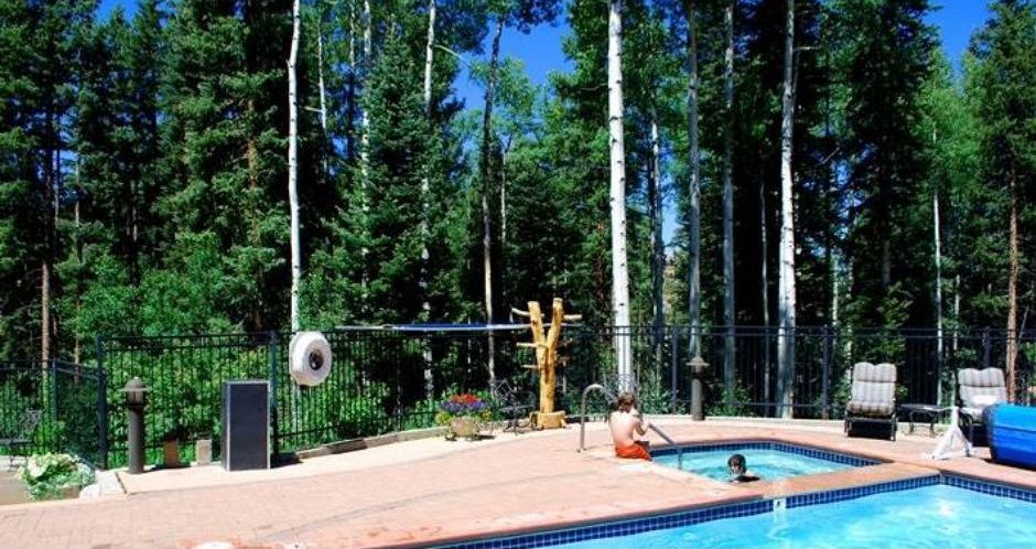 The outdoor pool and hot tub is a hit among guests. - image_3