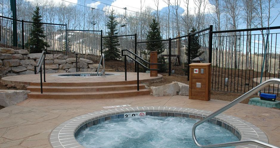 Enjoy outdoor hot tubs with slopeside views at Shooting Star. - image_2