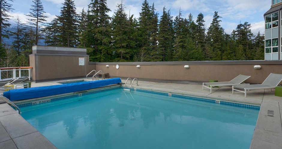 Enjoy the outdoor pool and hot tub. - image_3