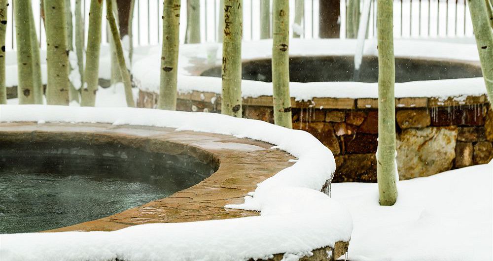 Snow-covered hot tubs welcome those tired skier legs. The Ritz-Carlton Bachelor Gulch - image_18
