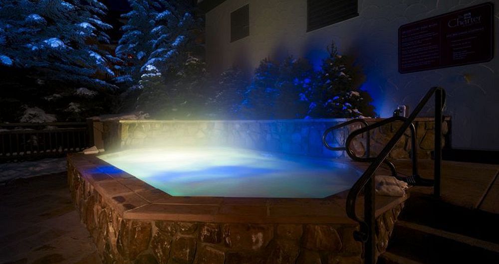 Enjoy the outdoor hot tub after a day on the slopes. Photo: The Charter at Beaver Creek - image_18