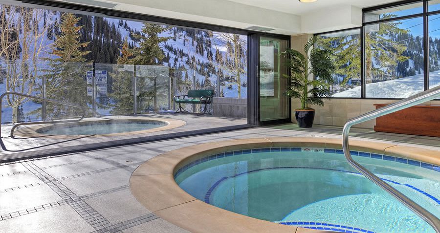 Hot tubs with a slopeside view. Photo: Rustler Lodge - image_3