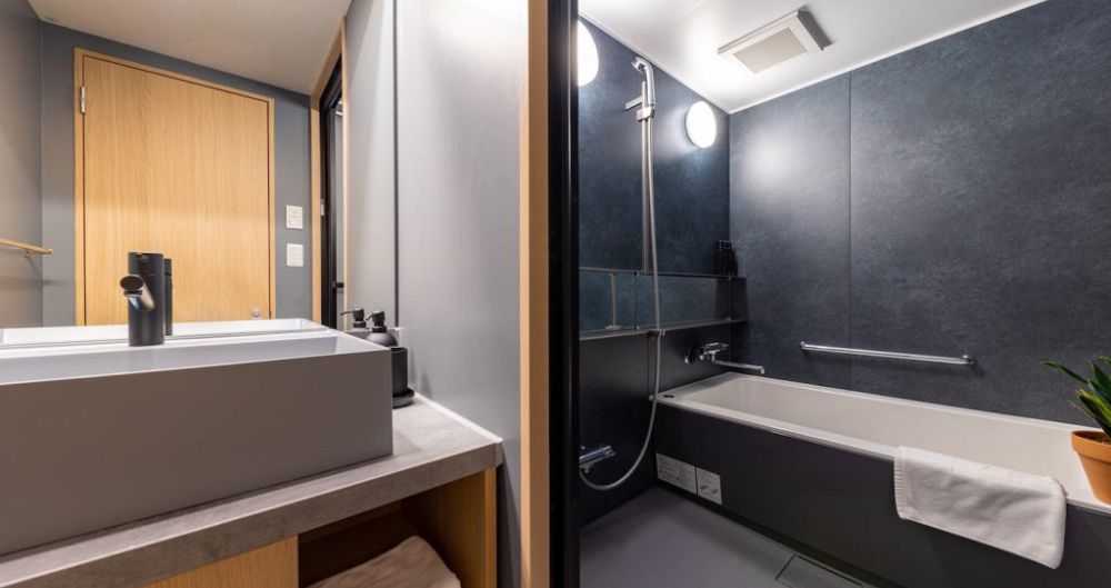Modern and comfortable bathrooms and amenities. - image_5